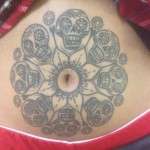 tattoos covering tummy tuck scars