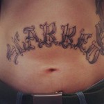 Tummy tuck and tattoo torso
