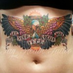 Many belly tattoos after tummy tuck